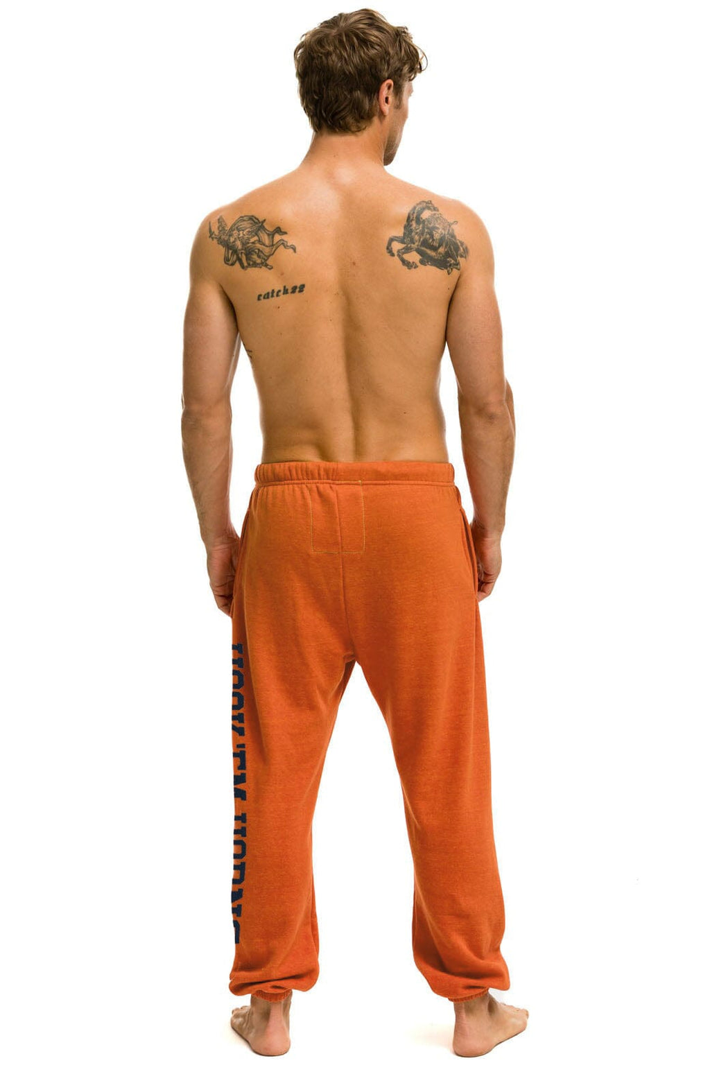 Retro UNIVERSITY OF TEXAS UNISEX CIRCLE PRINT SWEATPANTS - BURNT ORANGE