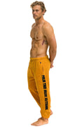 Retro PALM TREE FESTIVAL MONTECITO 2025 UNISEX SWEATPANTS - GOLD